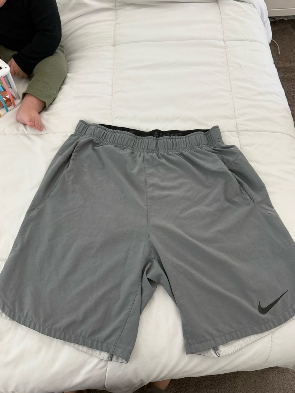 Nike Men's Gray Athletic Shorts with Black Swoosh